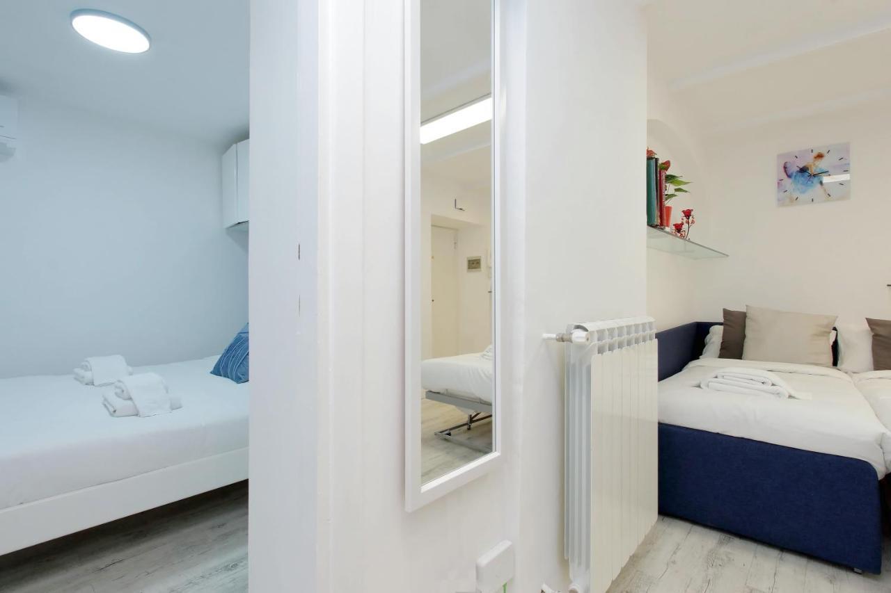 Ych-Confortevole Suite Al Colosseo Rome Bagian luar foto